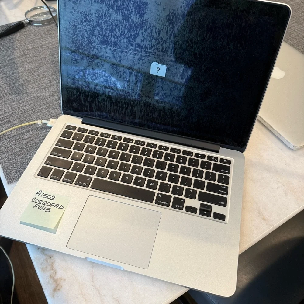 Apple Silver MacBook Pro with Black Keyboard